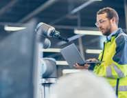 manufacturing worker on laptop