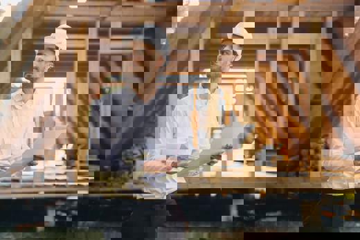 Construction Worker Following Building Plan