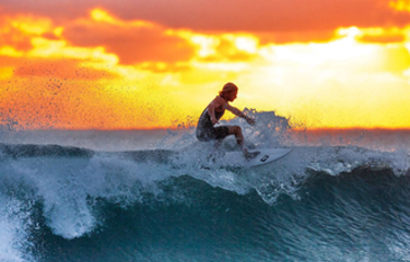 woman surfing using circle one surfboard