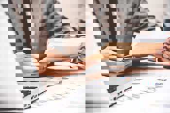 Business man in suit reading report