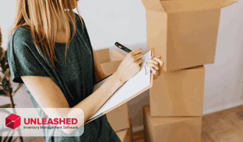 woman using clipboard to write notes