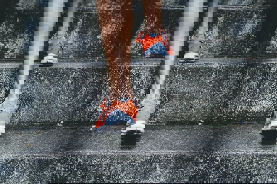 person walking up stairs