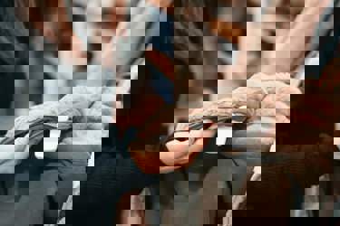 Shopper looking at coat