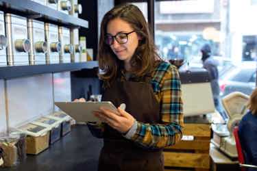 retailer looking at the tablet